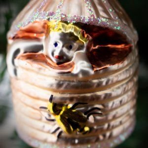 Baby in a Beehive, Old World Christmas glass ornament.